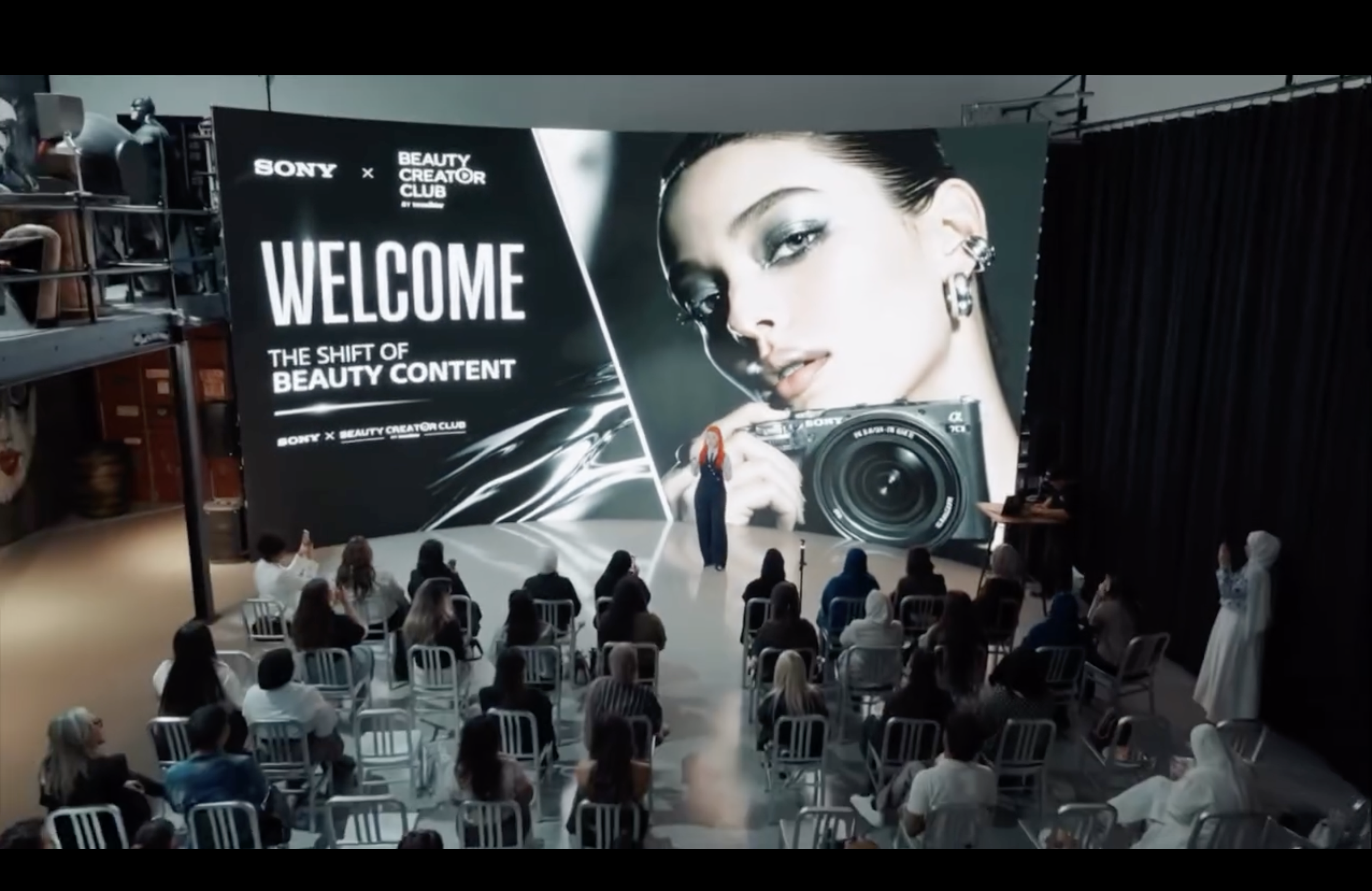 Audience and stage at the Sony and L’Oréal Beauty Creator Club event.