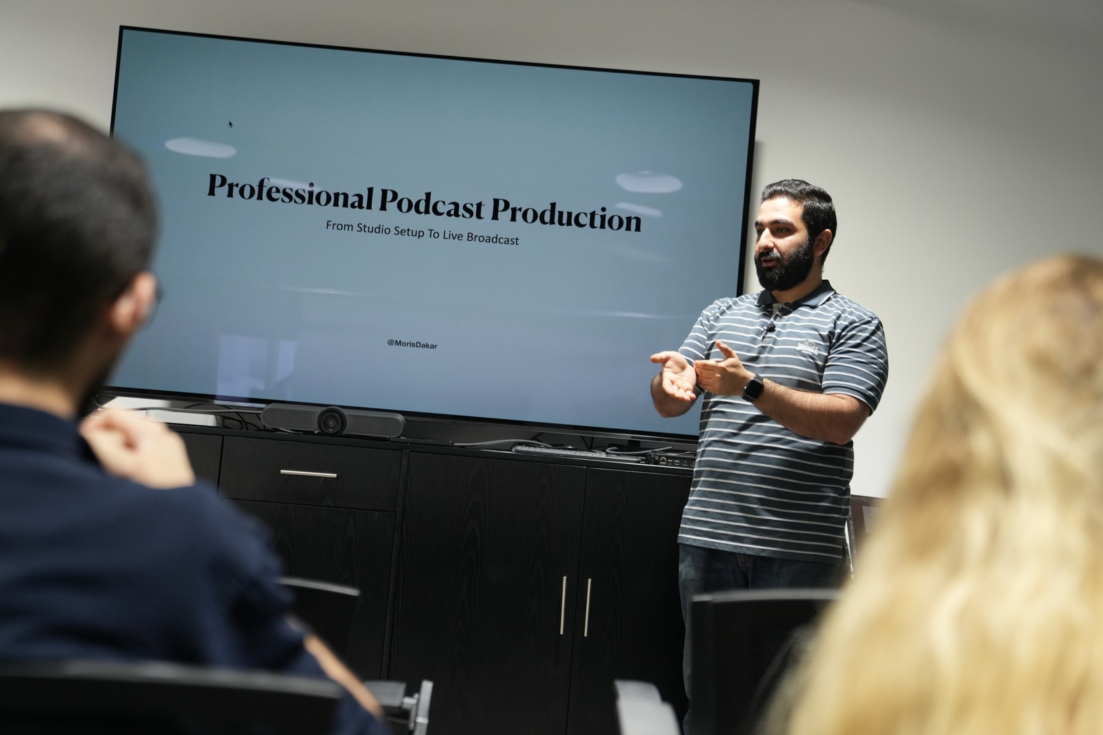 Moris presents professional podcast production to workshop attendees.